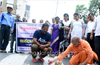 Interfaith workers paint speed-breakers on Good Friday